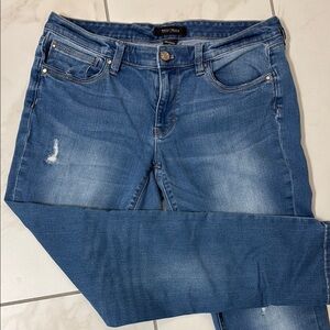 White House Black Market size 8 Girlfriend  slightly distressed Blue Jeans